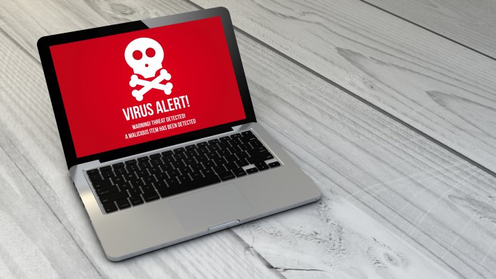 f-secure, antivirus, benefits, software, virus alert on red background on laptop display gray wooden floor